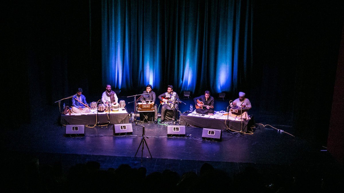 Artists performing together on a Sabrang concert stage